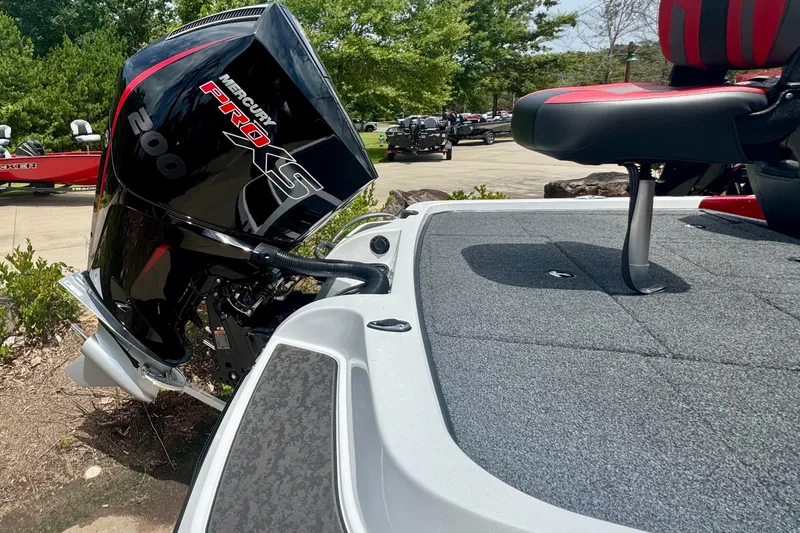 Slide: The Image of 2026 Nitro Z19 XL Pro boat with Mercury Pro XS 200 engine, outdoor setting. - 3