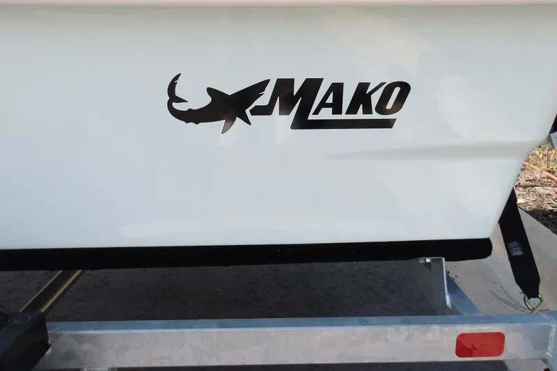 Slide: The Image of 2026 Mako Pro Skiff 13 CC boat logo on trailer. - 15
