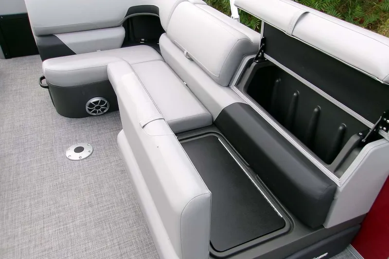 Slide: The Image of 2026 Sun Tracker Sportfish 24 XP3 boat interior with open storage compartments. - 15
