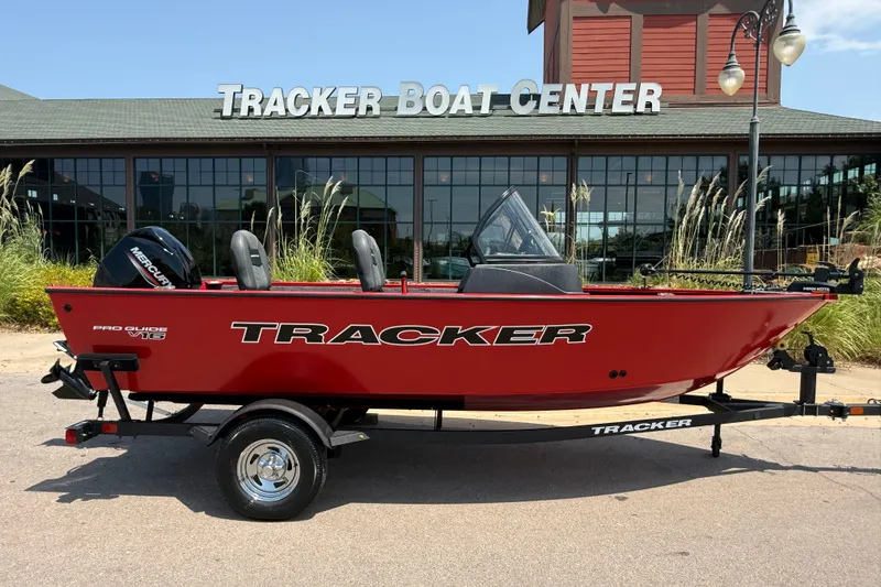 Slide: The Image of 2026 Tracker Pro Guide V-16 WT boat displayed at Tracker Boat Center. - 15