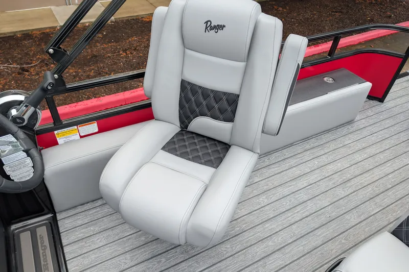 Slide: The Image of Luxurious seating on 2026 Ranger 220F boat, featuring gray upholstery and diamond stitching. - 7