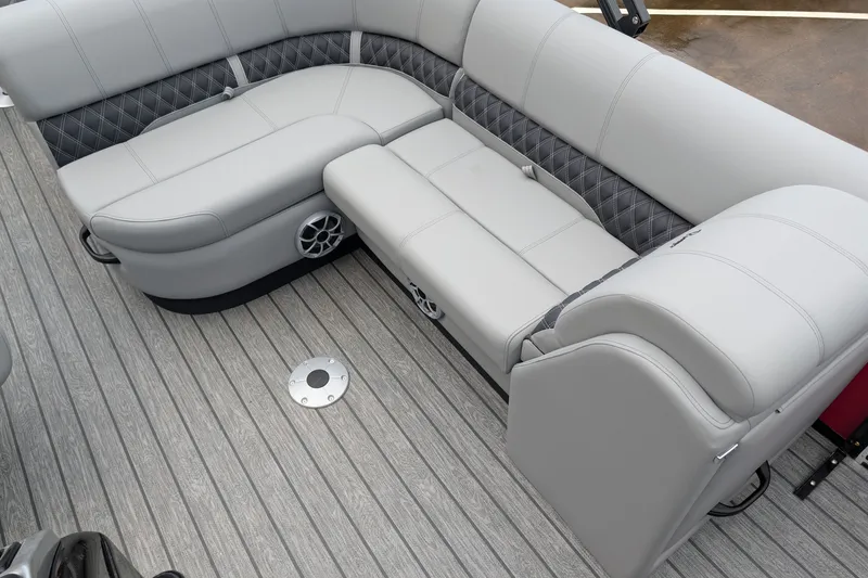 Slide: The Image of Luxurious seating on 2026 Ranger 220F boat with gray upholstery and diamond-pattern accents. - 10