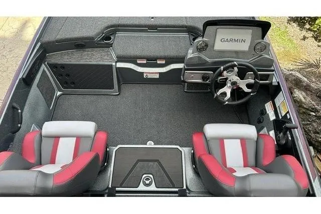 Slide: The Image of The image shows the cockpit of a Nitro Z20 XL Pro boat with two cushioned seats and a Garmin screen. - 6