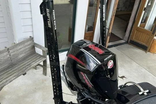 Slide: The Image of 2026 Nitro Z20 XL Pro boat engine with Minn Kota accessories, displayed outdoors. - 14