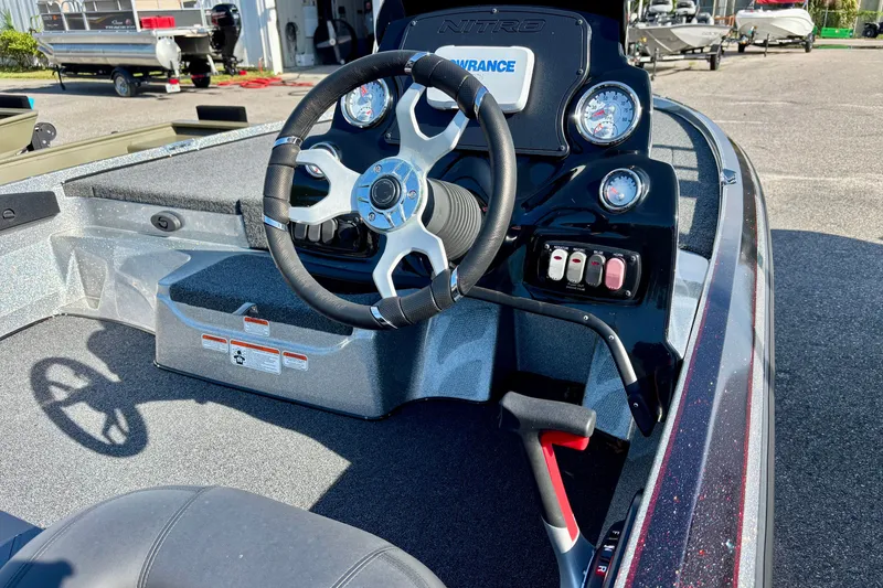 Slide: The Image of Steering console of a 2025 Nitro Z17 boat, featuring gauges and controls. - 5