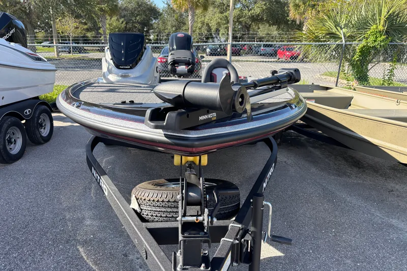 Slide: The Image of 2025 Nitro Z17 boat on trailer, featuring Minn Kota trolling motor. - 1