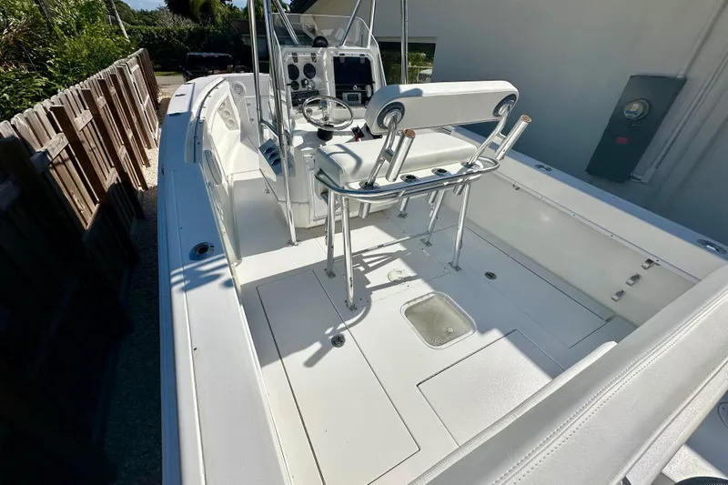 Slide: The Image of 2001 Contender 23 Open boat interior with steering console and seating. - 38
