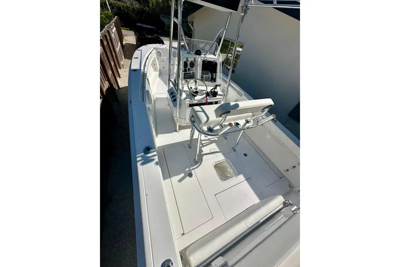 Slide: The Image of 2001 Contender 23 Open boat interior with steering console and seating. - 29