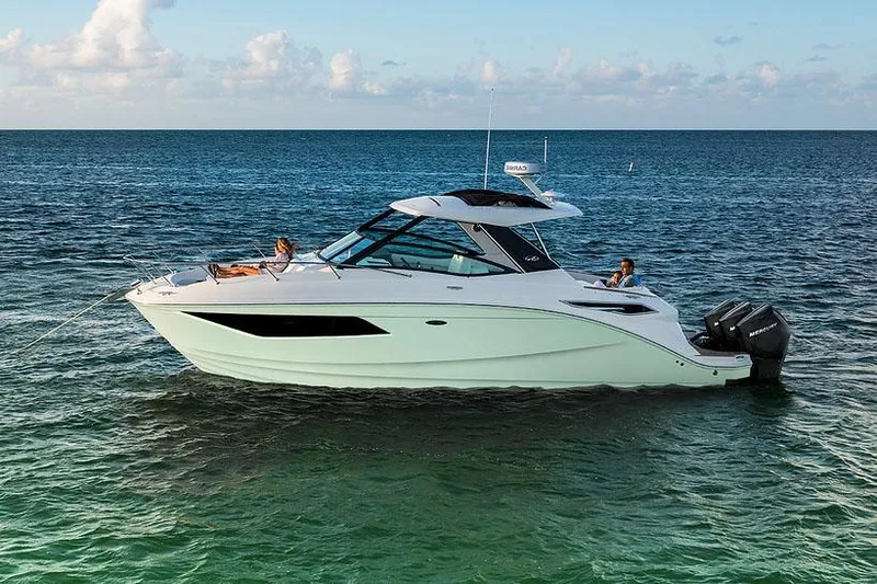 The Image of Manufacturer Provided Image: 2023 Sea Ray Sundancer 320 OB luxury motorboat on open water. - 1