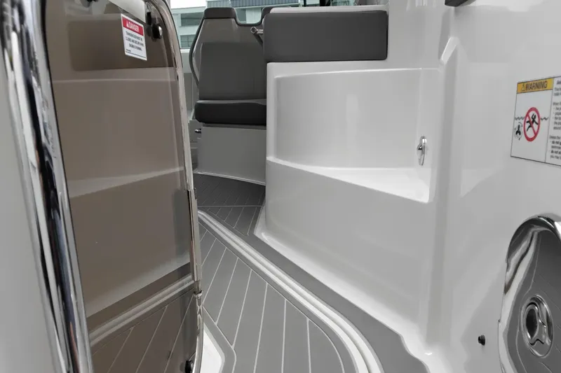 Slide: The Image of 2023 Sea Ray Sundancer 320 Outboard interior with sleek seating and modern design. - 42