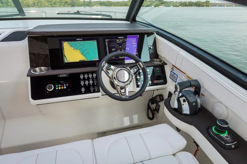 Slide: The Image of Manufacturer Provided Image: Cockpit of 2023 Sea Ray Sundancer 320 OB with advanced navigation system. - 4