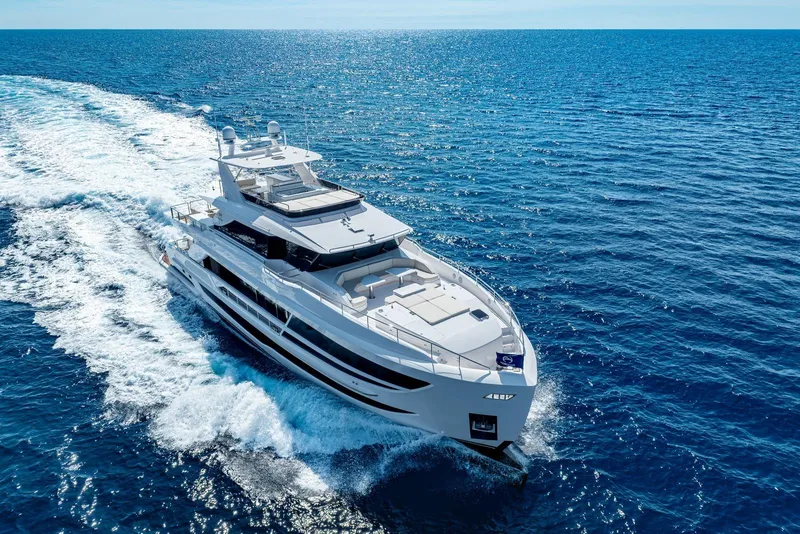 Slide: The Image of Luxurious 2026 Horizon FD100 yacht cruising on open blue sea. - 46