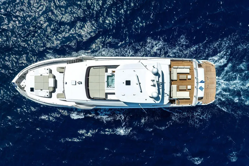 Slide: The Image of Aerial view of 2026 Horizon FD100 yacht cruising on deep blue ocean waters. - 5