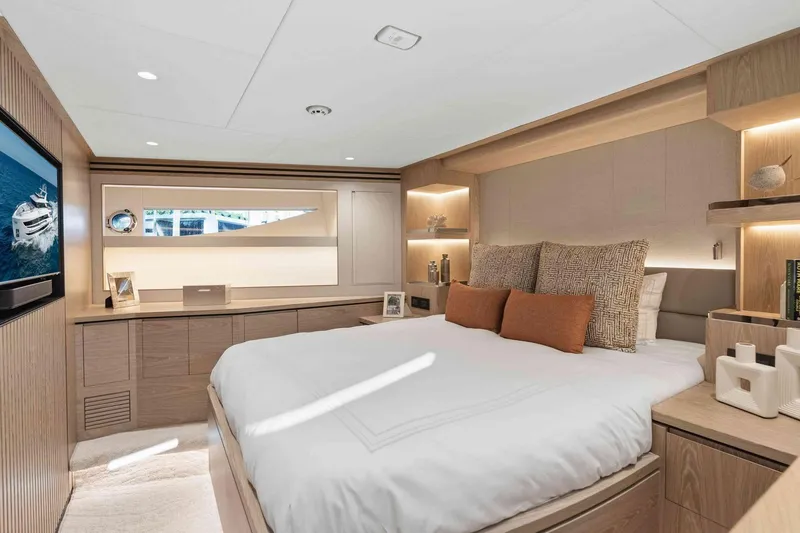 Slide: The Image of Luxurious bedroom interior on 2026 Horizon FD100 yacht, featuring modern design and elegant decor. - 19