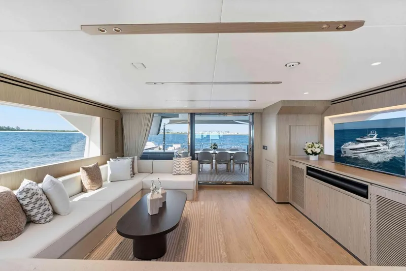 Slide: The Image of Luxurious interior of 2026 Horizon FD100 yacht with ocean view and elegant decor. - 2