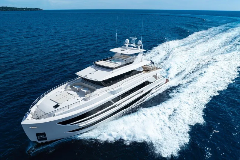 Slide: The Image of Luxurious 2026 Horizon FD100 yacht cruising on open blue sea. - 47