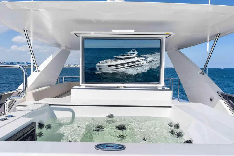 Slide: The Image of Luxurious Horizon FD100 yacht with jacuzzi and ocean view, 2026 model. - 35