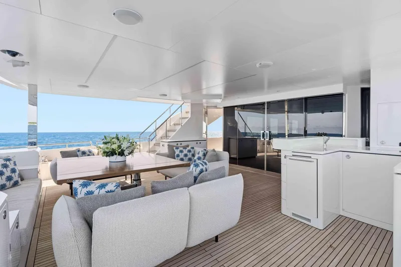 Slide: The Image of Luxurious Horizon FD100 yacht deck with elegant seating, ocean view, and modern amenities, 2026 model. - 32