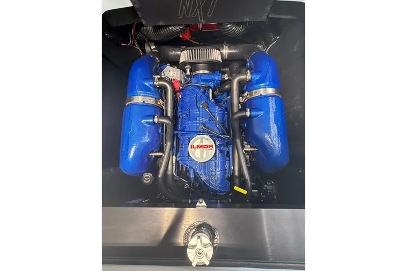 Slide: The Image of 2019 MasterCraft NXT22 engine with blue Ilmor components. - 15