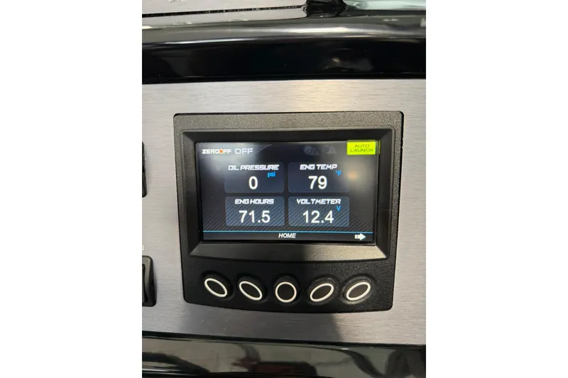Slide: The Image of 2019 MasterCraft NXT22 dashboard display showing engine temperature and voltmeter readings. - 31