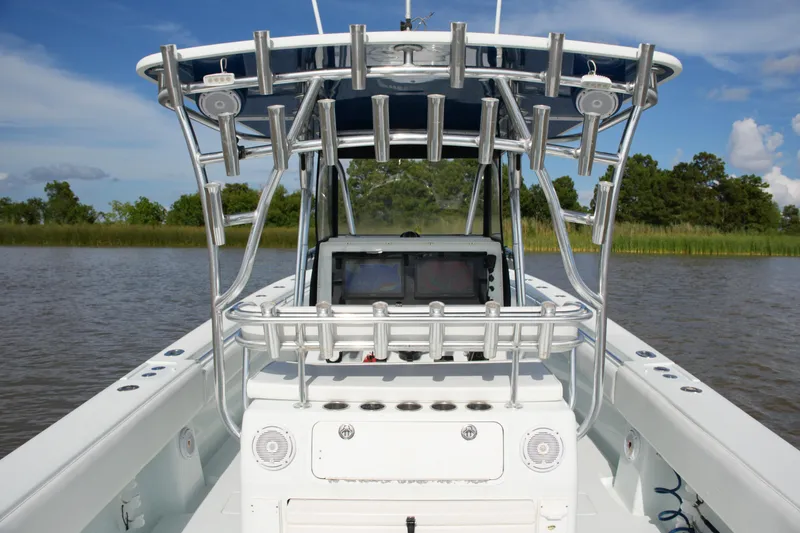Slide: The Image of 2013 Contender 39 ST boat with advanced navigation system on calm water. - 33