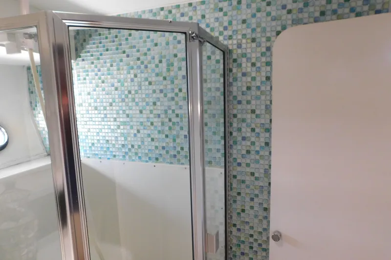 Slide: The Image of Shower area in 1992 Silverton 41 Aft Cabin with mosaic tile wall. - 82