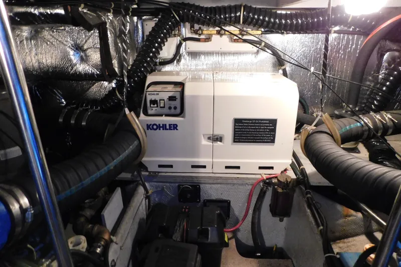 Slide: The Image of Engine room of 1992 Silverton 41 Aft Cabin with Kohler generator and wiring. - 93