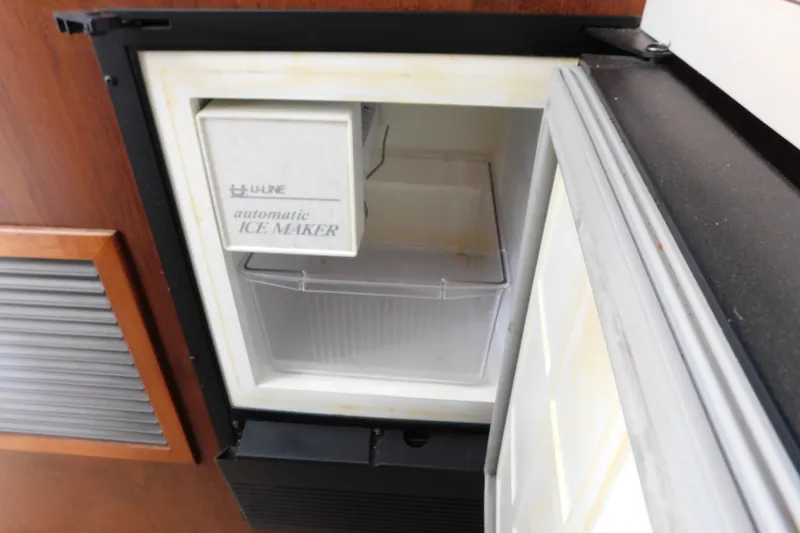 Slide: The Image of U-Line automatic ice maker inside 1992 Silverton 41 Aft Cabin yacht. - 86