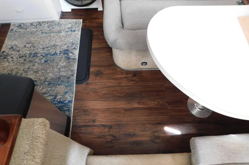 Slide: The Image of Interior of 1992 Silverton 41 Aft Cabin with wood flooring and modern furnishings. - 59