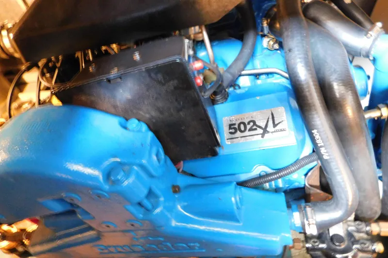 Slide: The Image of Engine of 1992 Silverton 41 Aft Cabin, Model 502XL, with blue components. - 91