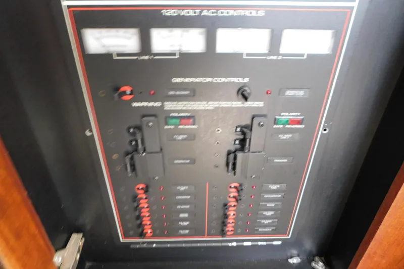 Slide: The Image of Electrical control panel on a 1992 Silverton 41 Aft Cabin boat. - 54