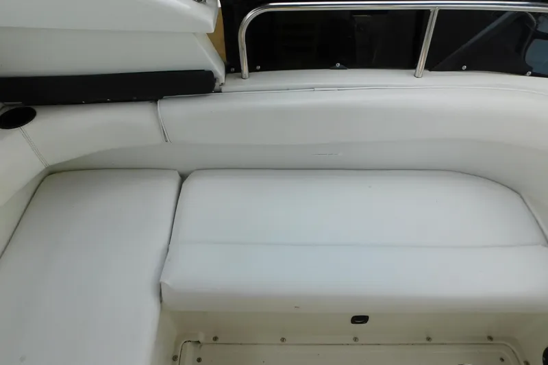Slide: The Image of White seating area on a 1992 Silverton 41 Aft Cabin boat. - 34