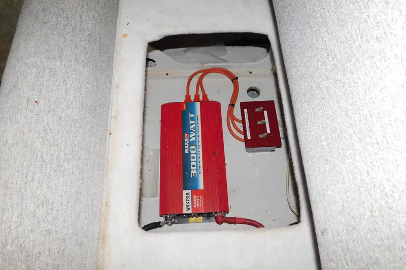 Slide: The Image of Electrical setup in a 1992 Silverton 41 Aft Cabin boat, featuring a 3000-watt inverter. - 83