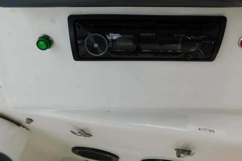 Slide: The Image of 1992 Silverton 41 Aft Cabin boat dashboard with Sony stereo system. - 28