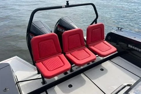 Slide: The Image of Red seats on a 2021 BRABUS 900 Shadow boat, with dual engines, on water. - 12