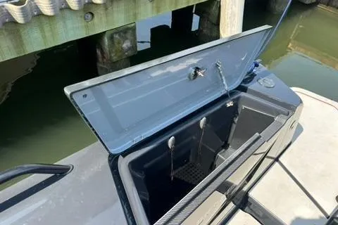 Slide: The Image of Open storage compartment on a 2021 BRABUS 900 Shadow boat, dockside view. - 33
