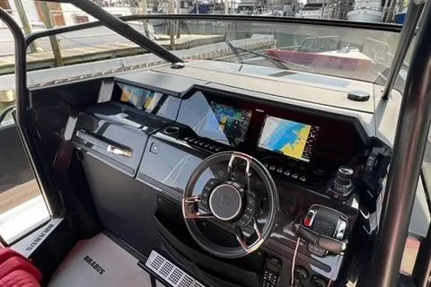 Slide: The Image of Cockpit of 2021 BRABUS 900 Shadow with advanced navigation displays and controls. - 31