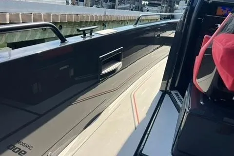 Slide: The Image of 2021 BRABUS 900 Shadow yacht deck with sleek black finish and modern design elements. - 38