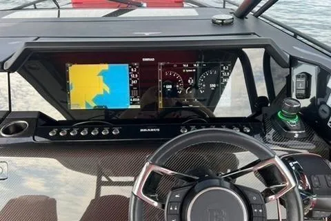 Slide: The Image of 2021 BRABUS 900 Shadow dashboard with navigation display and steering wheel. - 17