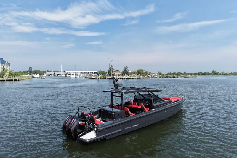Slide: The Image of 2021 BRABUS 900 Shadow boat on calm water, featuring sleek design and powerful engines. - 7