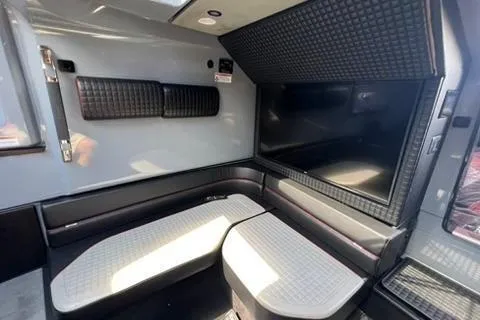 Slide: The Image of Interior of 2021 BRABUS 900 Shadow, featuring sleek seating and modern design elements. - 24