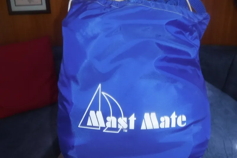 Slide: The Image of Blue "Mast Mate" bag on a Catalina 320, 1998 model sailboat. - 9