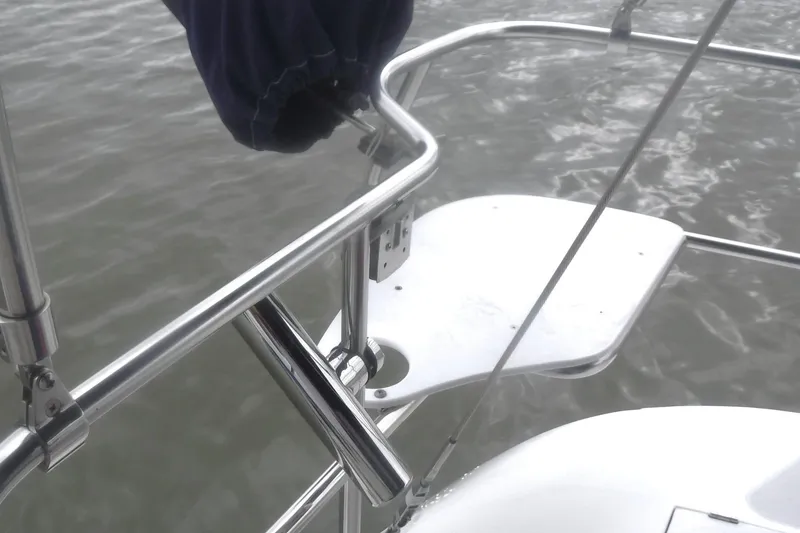 Slide: The Image of Stainless steel railing on a 1998 Catalina 320 sailboat over water. - 11