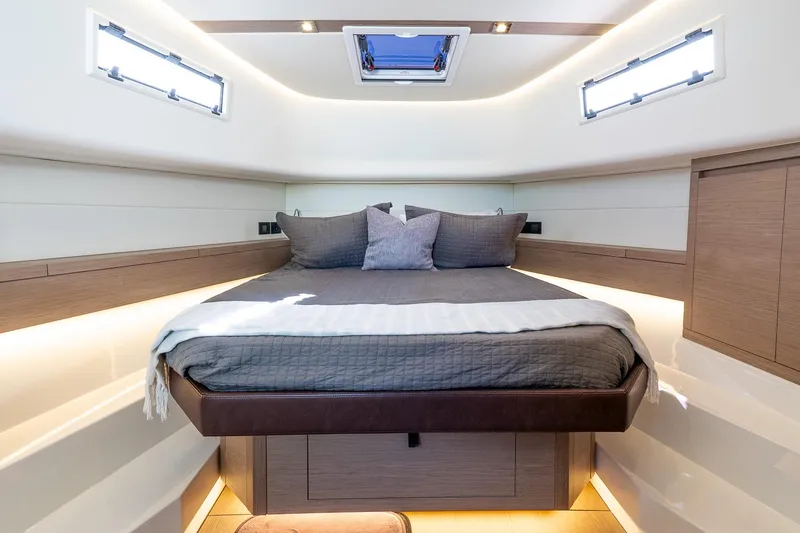 Slide: The Image of Luxurious cabin interior of 2024 Pardo Yachts 43, featuring a cozy bed and modern design. - 38