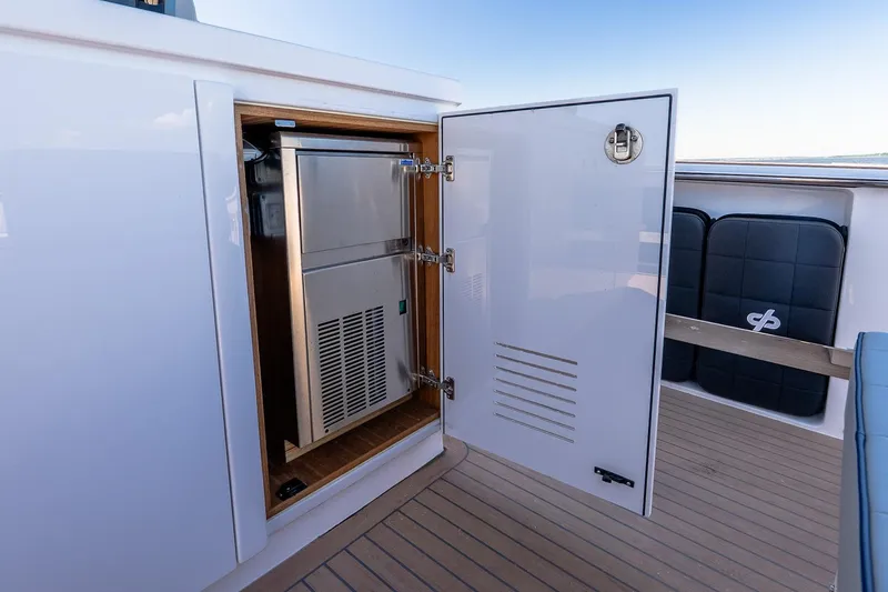 Slide: The Image of Open storage compartment on 2024 Pardo Yachts 43, featuring sleek design and modern amenities. - 26