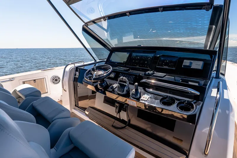 Slide: The Image of 2024 Pardo Yachts 43 cockpit with modern controls and ocean view. - 30