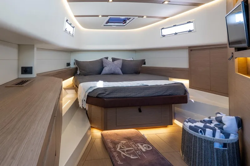 Slide: The Image of Luxurious interior cabin of 2024 Pardo Yachts 43, featuring modern design and cozy bedding. - 37