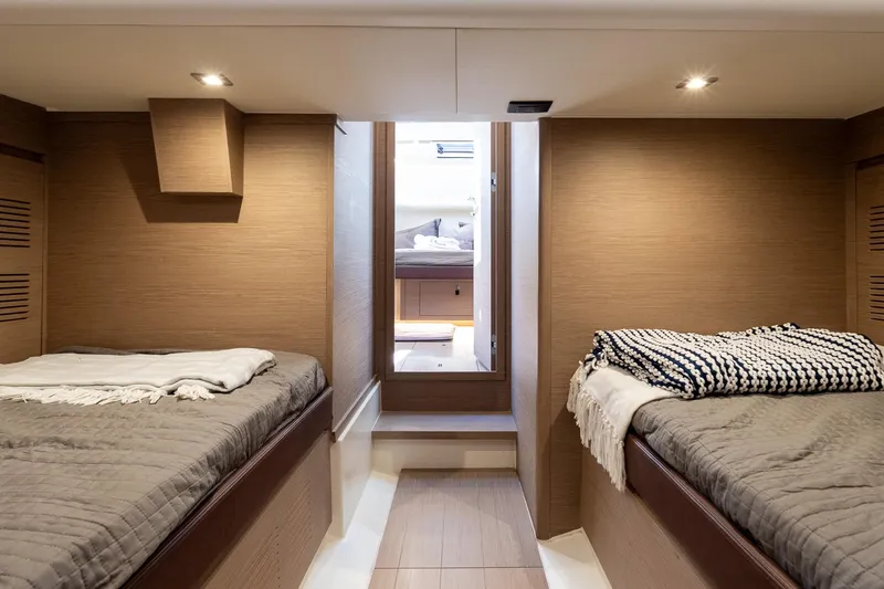 Slide: The Image of Luxurious cabin interior of 2024 Pardo Yachts 43 with twin beds and modern design. - 42