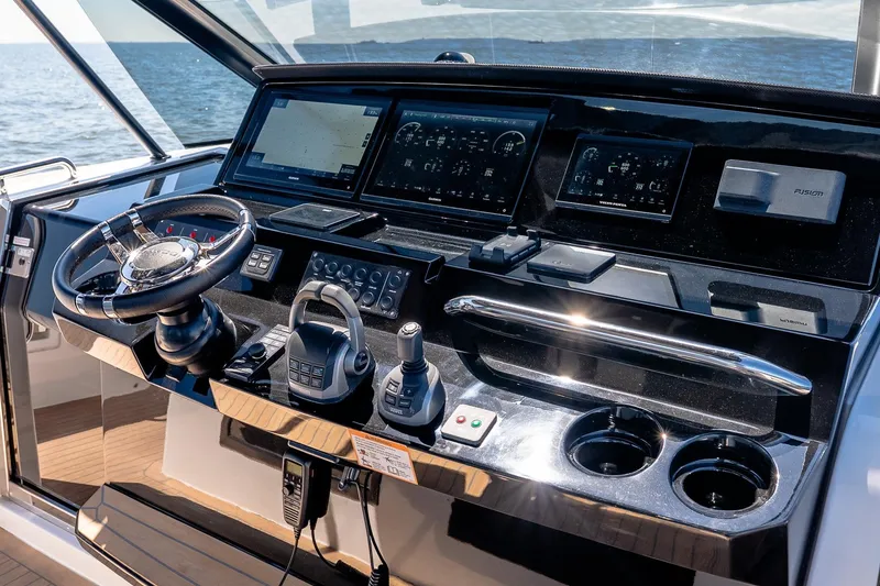 Slide: The Image of Helm of 2024 Pardo Yachts 43 with advanced navigation controls and displays. - 31