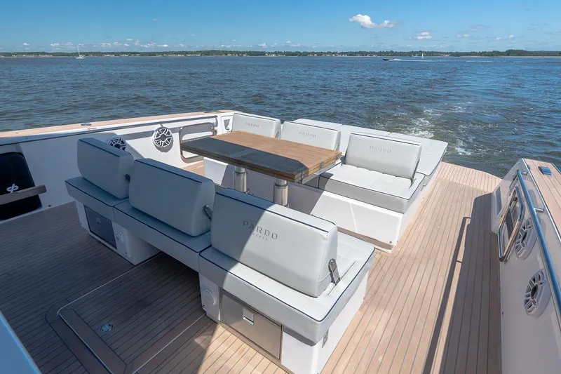 Slide: The Image of Luxurious 2024 Pardo Yachts 43 deck with elegant seating and ocean view. - 20